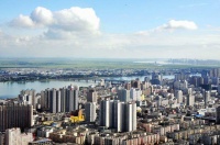 房企悄然布局三四线 热门城市土地平均成交溢价率超30%