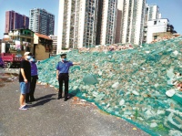 武汉半年内将搬掉119座建筑垃圾山 建筑弃料再利用率达60%