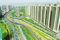 太原“九河”治理:绿树、立交桥、高楼相映构成都市美景图