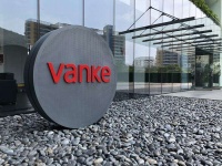 万科为广信资产包引入七家战投 回笼资金390.4亿元