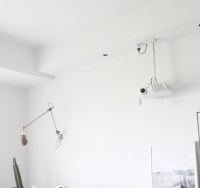 小户型投影仪布局,空间难题这样解决,有喜欢窝在沙发看电影的吗